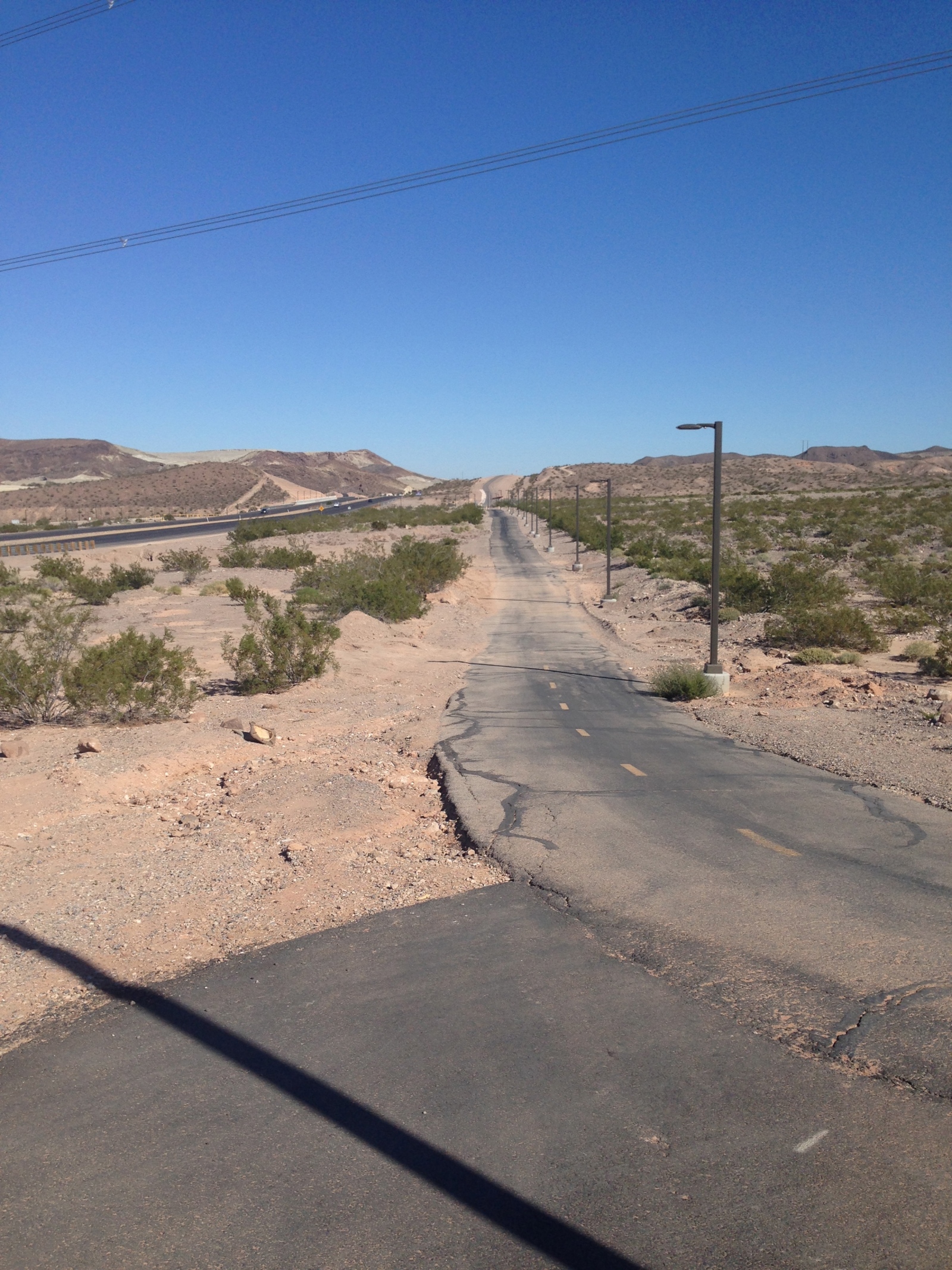 Riding parallel to Lake Mead Pkwy.  Pointing to the east.